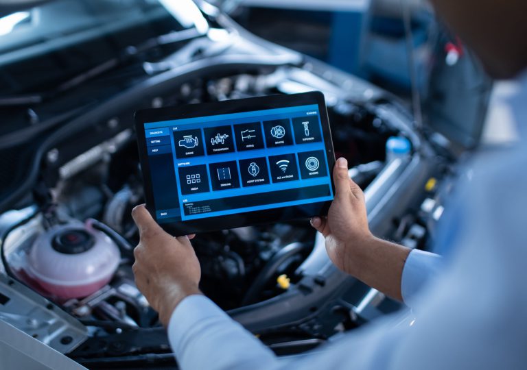 Car,Service,Manager,Or,Mechanic,Uses,A,Tablet,Computer,With
